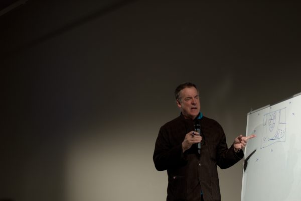 Matt Mullican on his hypnosis performances (2011), lecture. Photo: Marleen Özgür.
