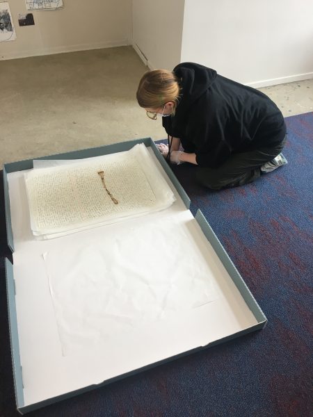 Visitor-researcher Marina Pollock engages with materials from Gift Science Archive at mistral, Amsterdam. Photo: Megan Hoetger