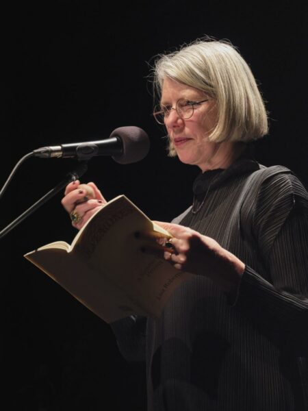 Lisa Robertson reading in the Grand Luxe Hall, Feb 2, 2023. Photo by Rachel Topham Photography. Courtesy of Western Front.