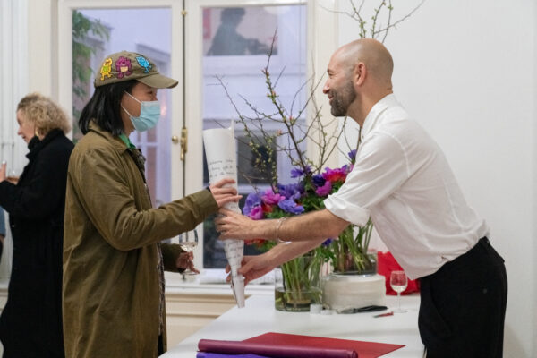 Benny Nemer's floral action as part of 'Anemones: A Simone Weil Project' (2021), book launch. Photo: Temra Pavlovic.